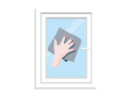 Hand cleaning the window with a cloth