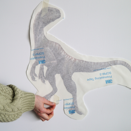 Scissors cutting out each of the stickers